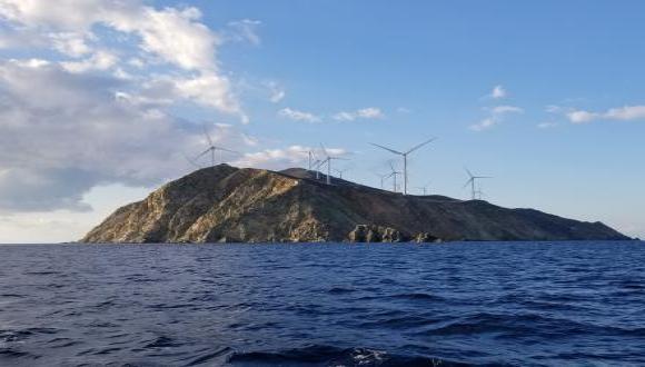 תכנון טורבינות רוח למיקסום תועלת חברתית. בתמונה:  Agios Georgios, אי טורבינות רוח ביוון